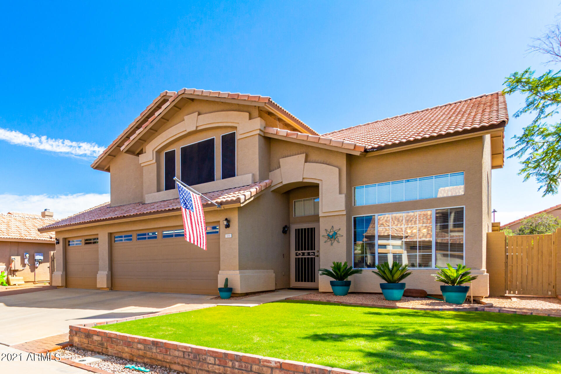 531 West Laredo Avenue Gilbert, AZ 85233 - Photo 3 of 35 Beautiful grass landscape