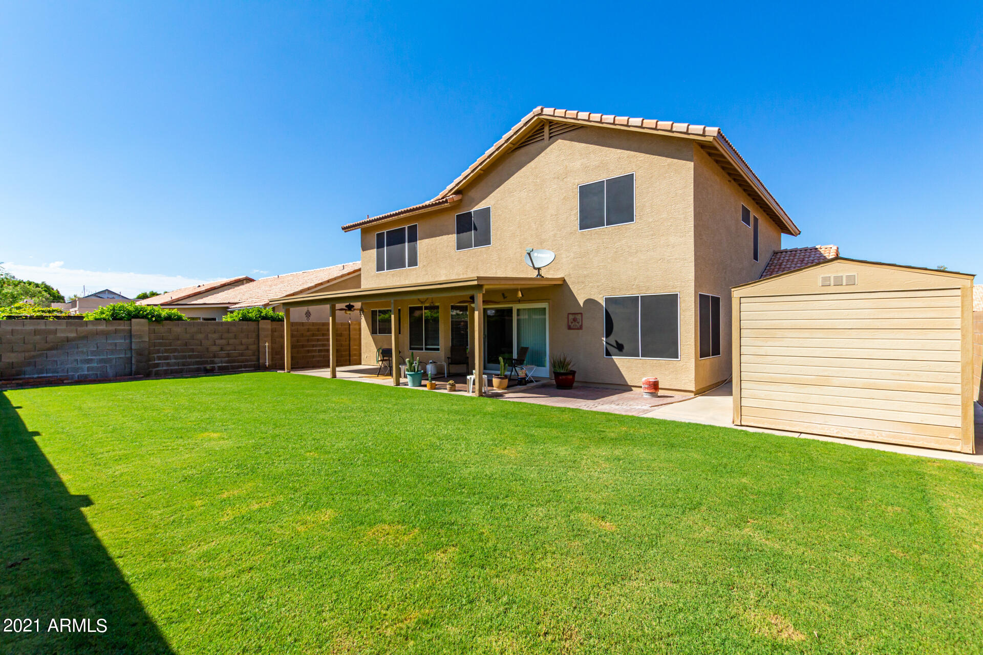 531 West Laredo Avenue Gilbert, AZ 85233 - Photo 31 of 35 Storage shed stays!