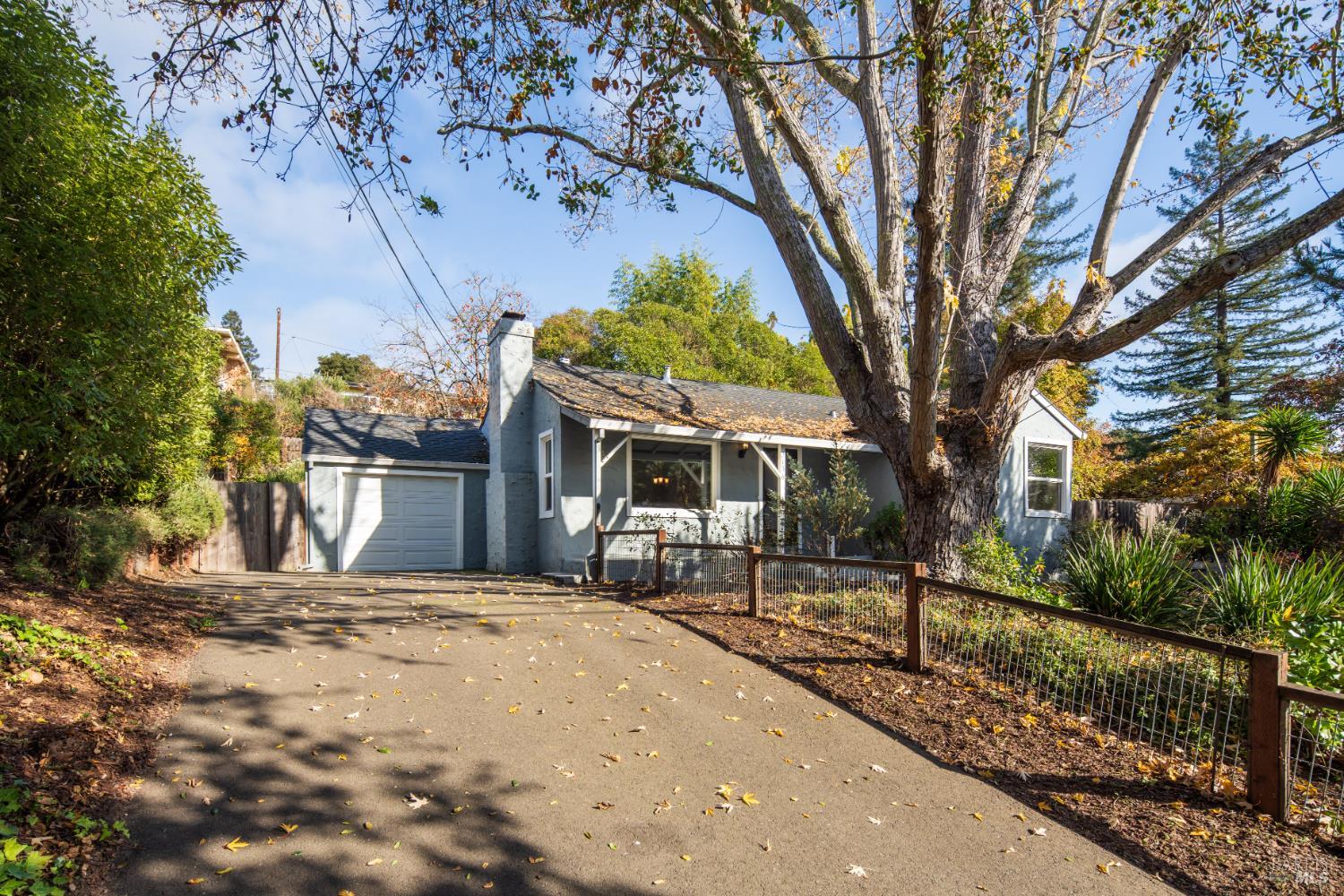 2136 Franklin Avenue Santa Rosa, CA 95404 - Photo 1 of 22 a view of a house with a tree in the background
