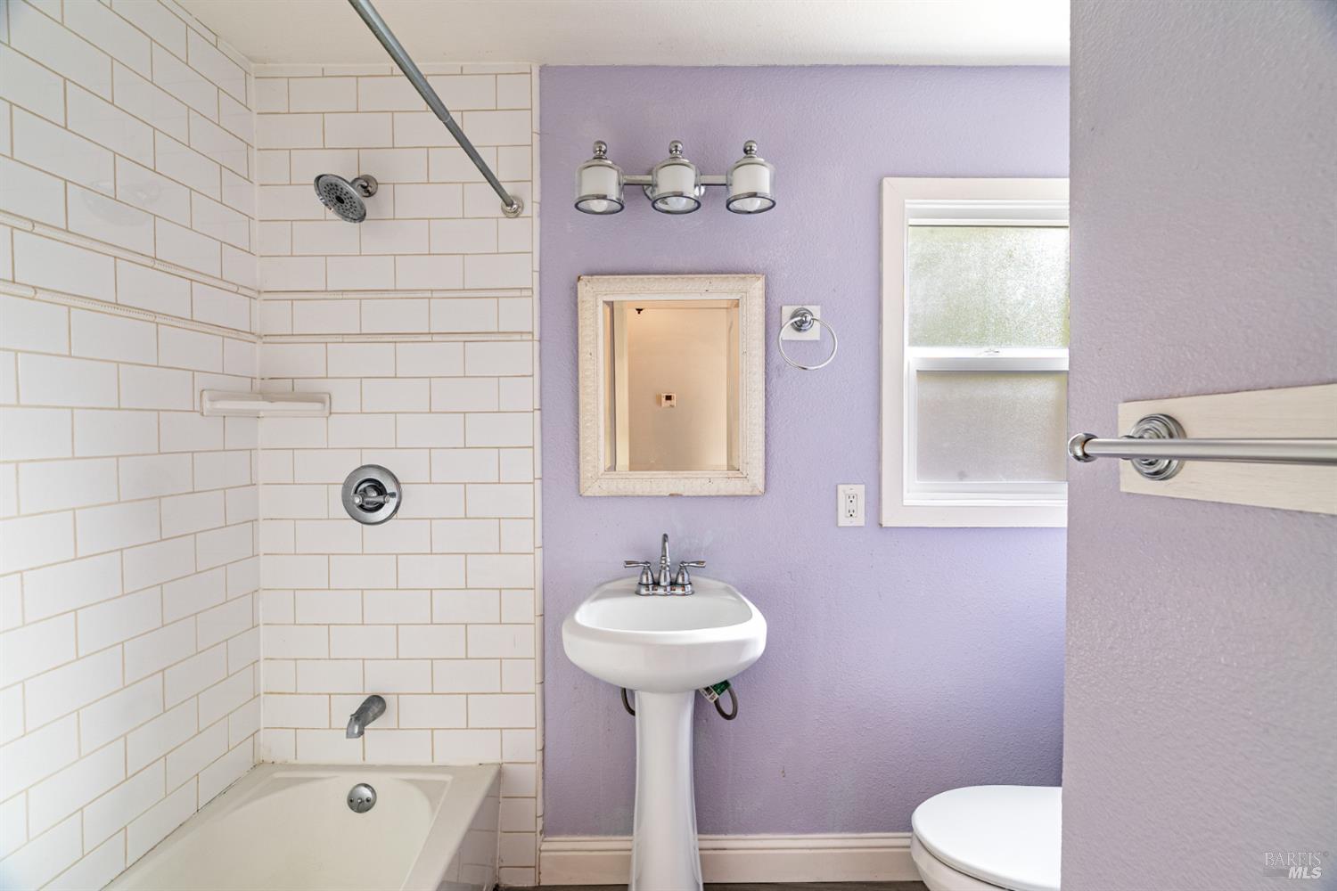 2136 Franklin Avenue Santa Rosa, CA 95404 - Photo 13 of 22 a bathroom with a sink toilet and shower