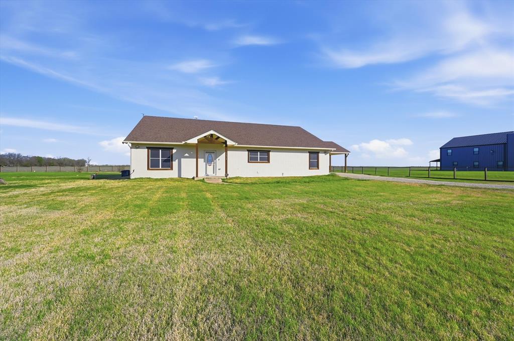 1616 Nash-Howard Road Waxahachie, TX 75165 - Photo 5 of 36 a house view with a big yard