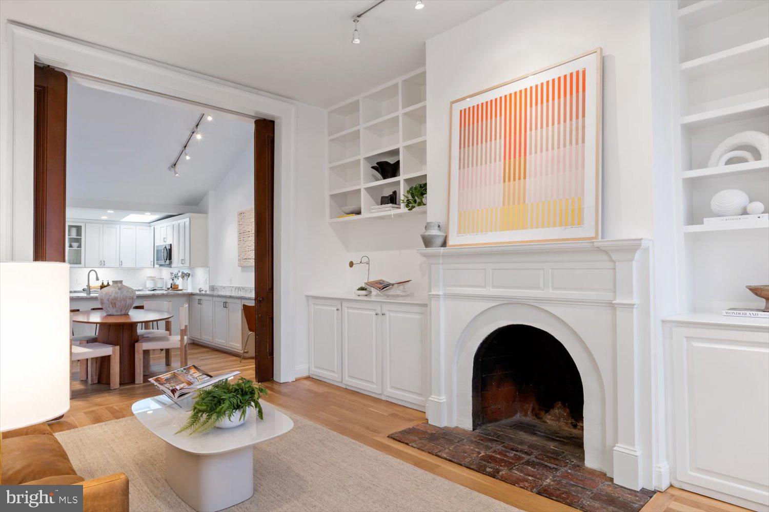 203 9th Street Southeast Washington, DC 20003 - Photo 6 of 50 Living room w/wood burning fireplace
