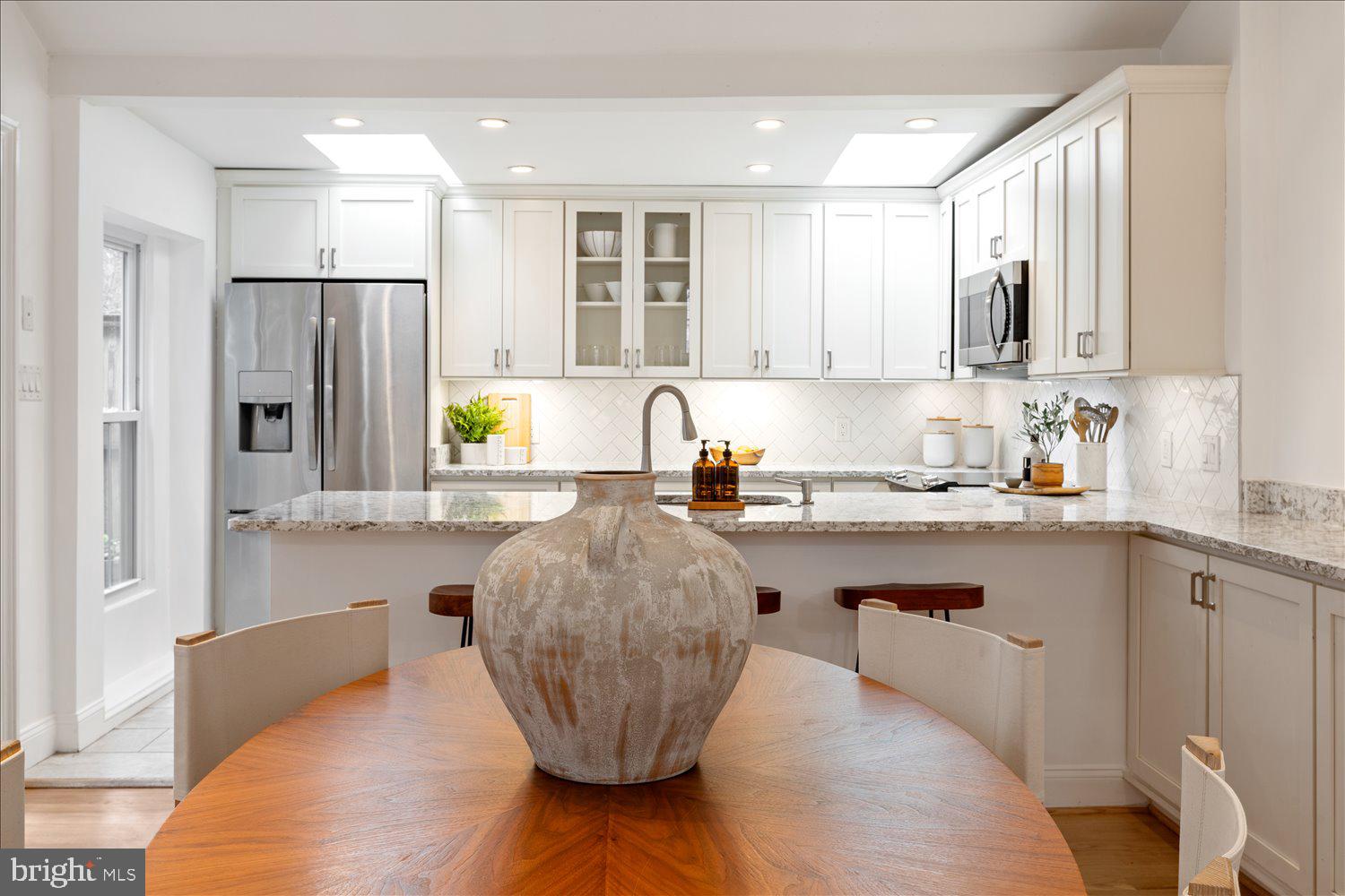 203 9th Street Southeast Washington, DC 20003 - Photo 8 of 50 Open dining room and kitchen