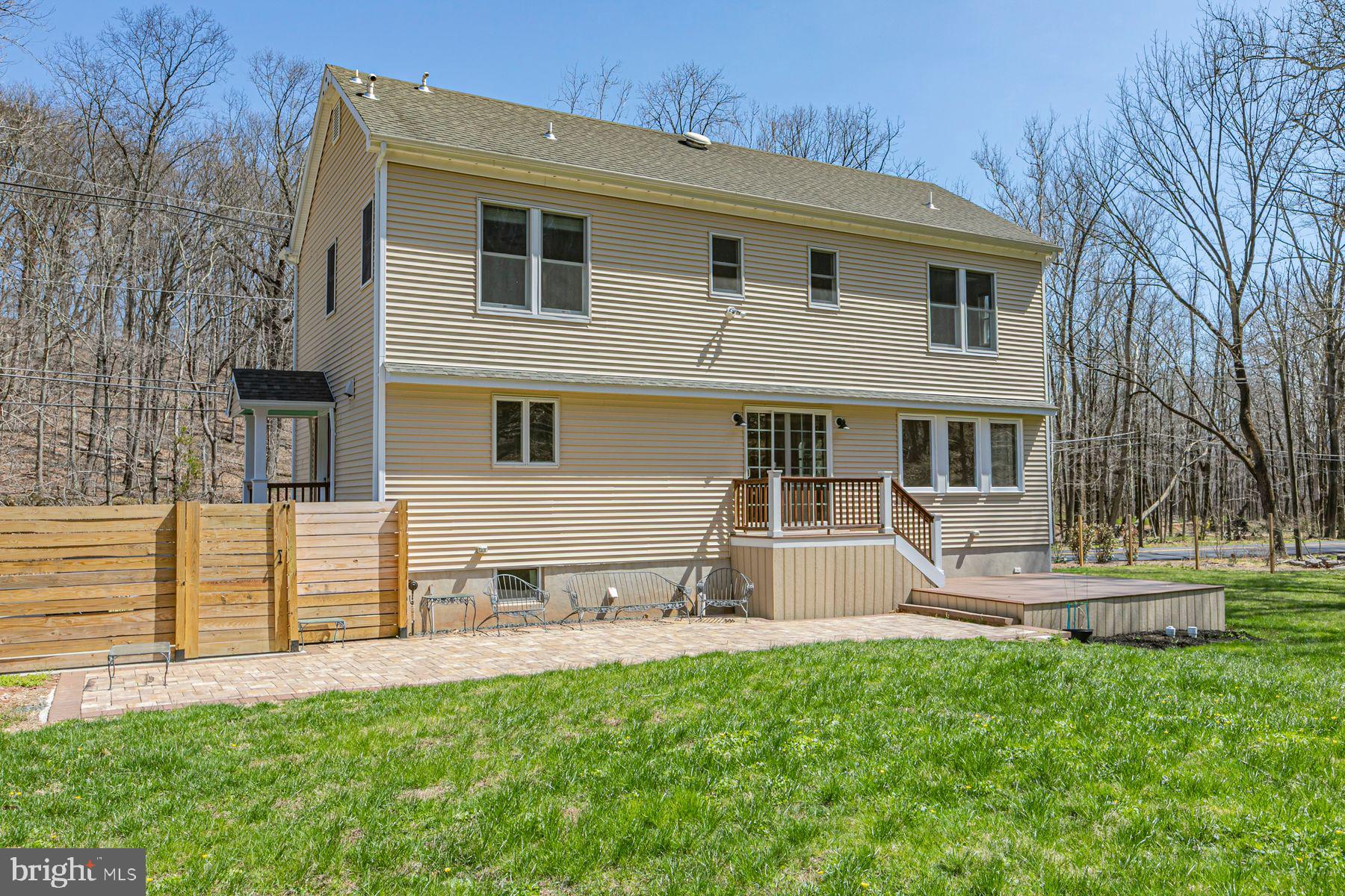 310 Hollow Road Skillman, NJ 08558 - Photo 28 of 32 a front view of a house with a yard