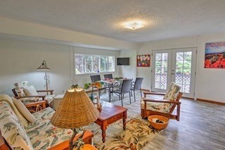 19-3940 Hoonanea Street Volcano, HI 96785 - Photo 2 of 30 a living room with furniture and wooden floor