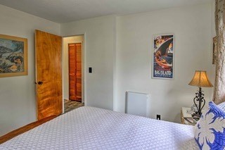 19-3940 Hoonanea Street Volcano, HI 96785 - Photo 23 of 30 a bedroom with a bed and a window