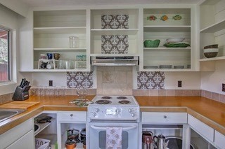 19-3940 Hoonanea Street Volcano, HI 96785 - Photo 9 of 30 a kitchen with a stove and cabinets