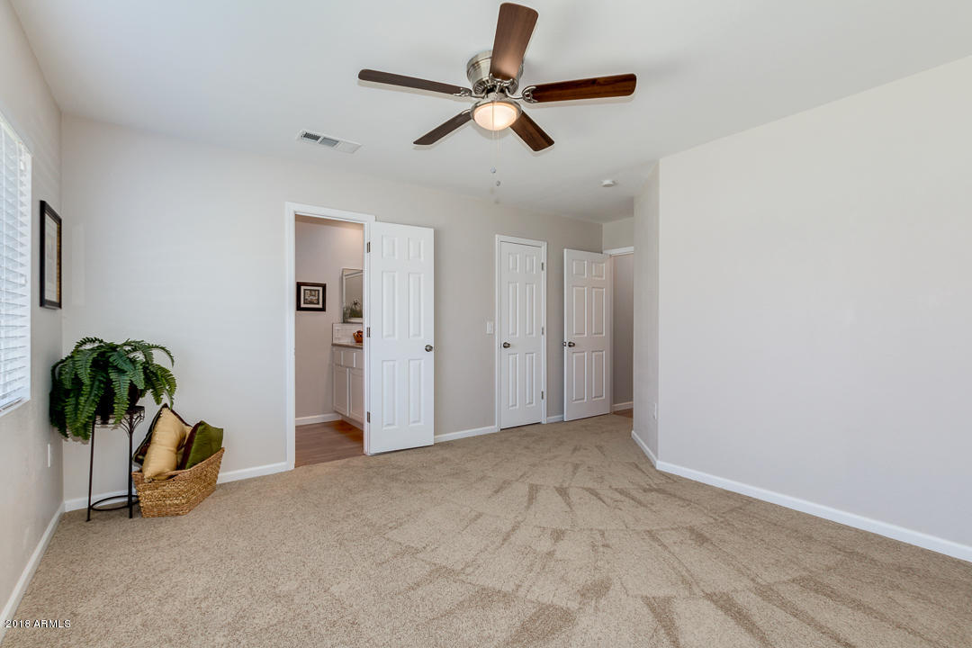 6320 Casper Road Mesa, AZ 85205 - Photo 17 of 35 a view of a livingroom with a staircase