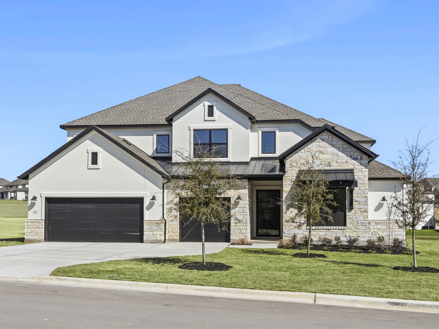 2508 Chiavari Way Leander, TX 78641 - Photo 1 of 24 Modern stone and stucco facade creates a commanding curb presence.