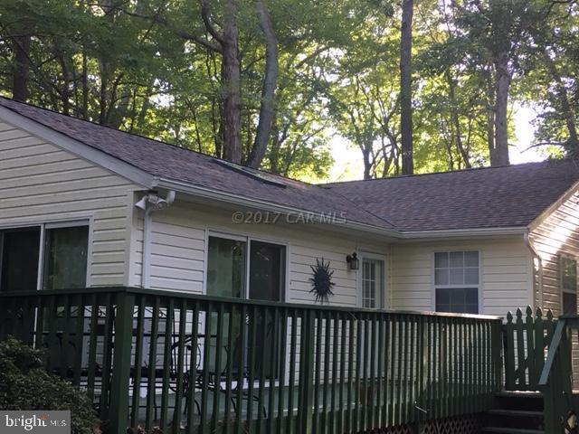 101 Pinehurst Road Ocean Pines, MD 21811 - Photo 1 of 14 a view of a house with a deck