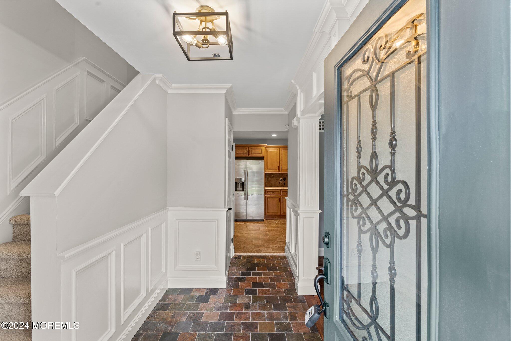 10 Bovanko Road Cream Ridge, NJ 08514 - Photo 3 of 48 a view of a hallway with wooden floor and windows