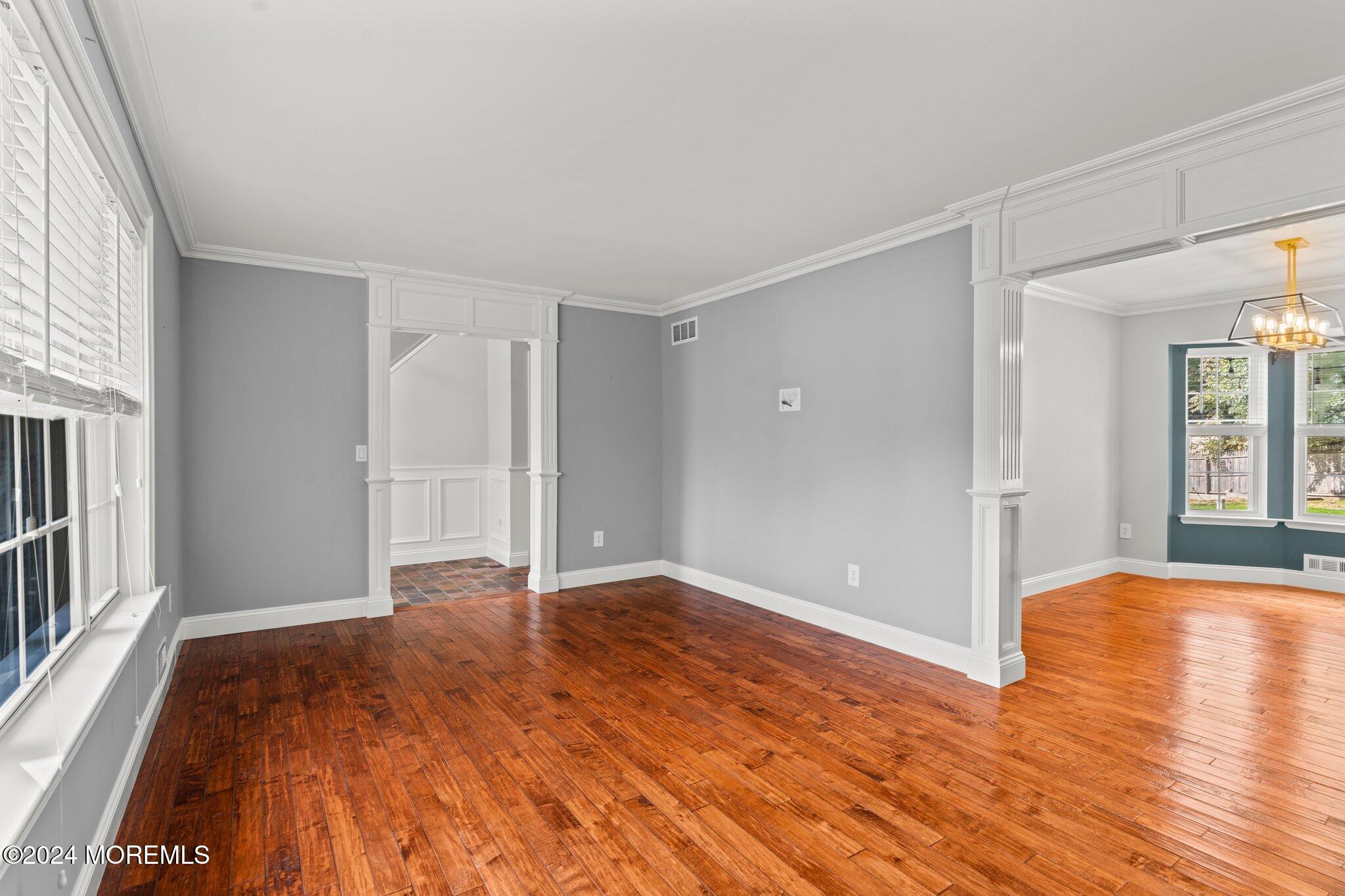 10 Bovanko Road Cream Ridge, NJ 08514 - Photo 6 of 48 a view of empty room with wooden floor and fan