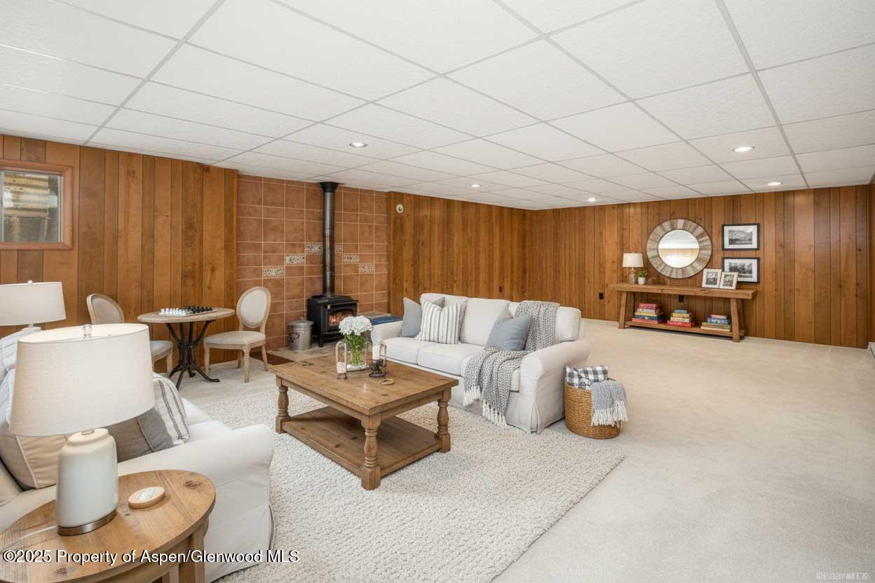 1849 Odin Drive Silt, CO 81652 - Photo 17 of 28 a living room with furniture and a flat screen tv