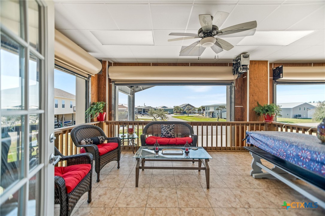 265 Coastal Oaks Loop Port O'Connor, TX 77982 - Photo 19 of 48 a balcony with furniture and a potted plant