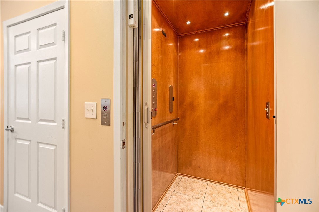 265 Coastal Oaks Loop Port O'Connor, TX 77982 - Photo 23 of 48 a view of a bathroom from a hallway