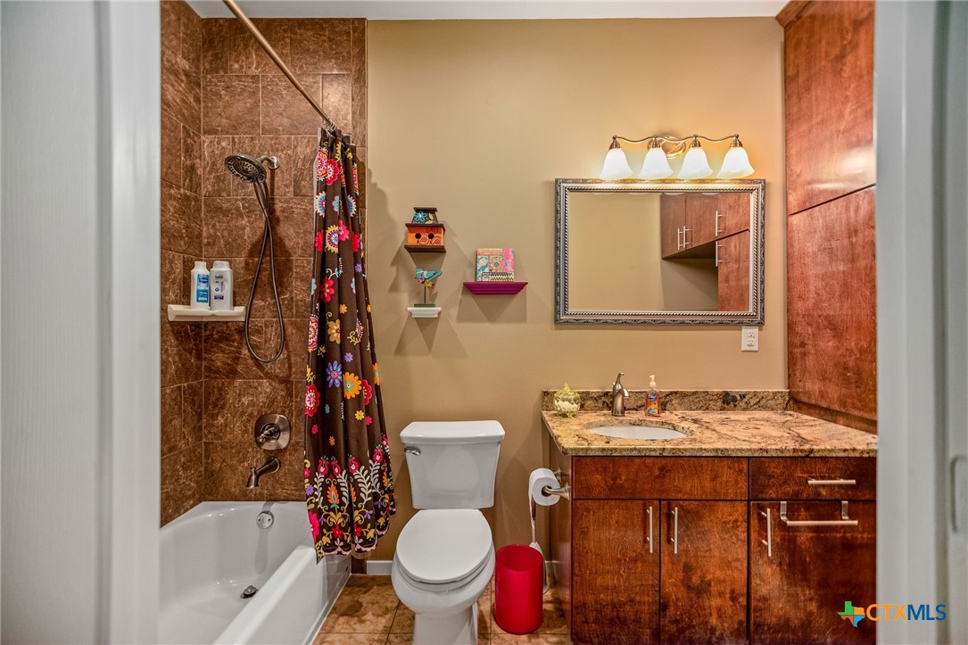 265 Coastal Oaks Loop Port O'Connor, TX 77982 - Photo 27 of 48 a bathroom with a sink toilet and shower