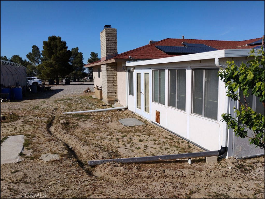 4077 Amador Road Phelan, CA 92371 - Photo 12 of 40 a front view of a house with a yard