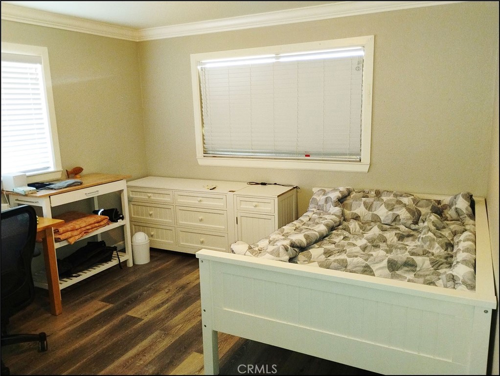 4077 Amador Road Phelan, CA 92371 - Photo 16 of 40 a view of a room that has a bed and a window