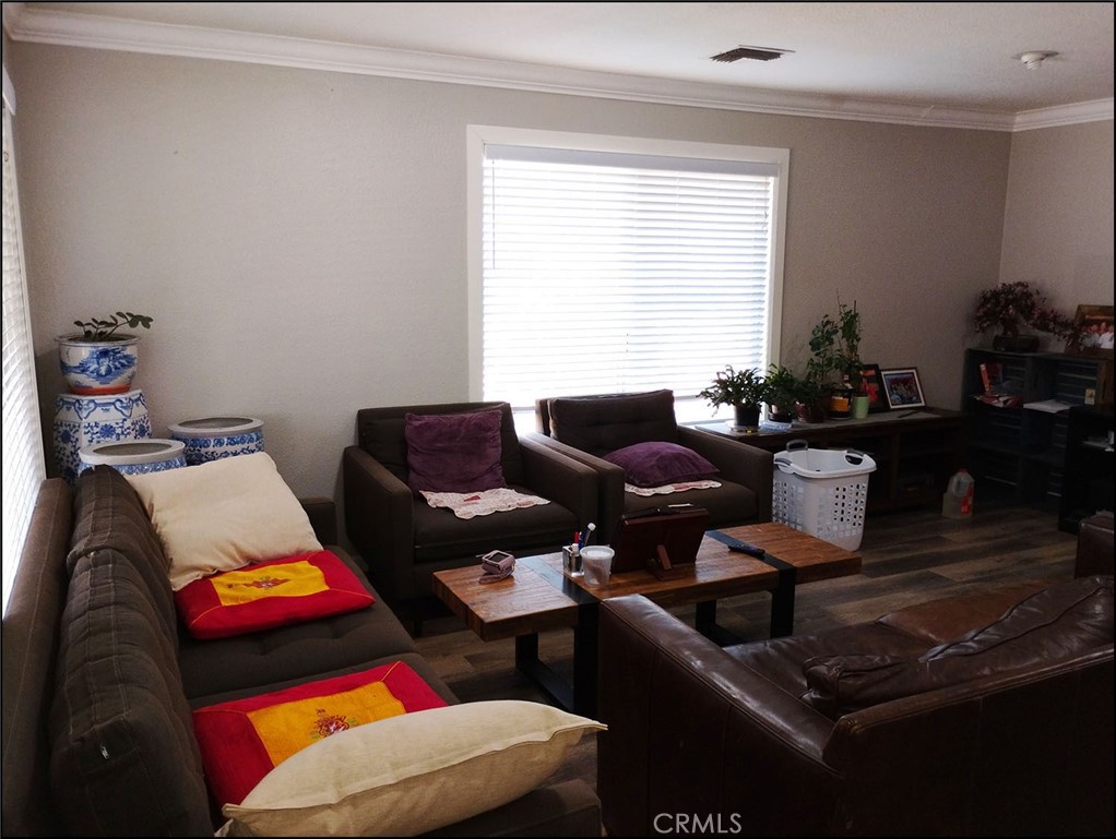 4077 Amador Road Phelan, CA 92371 - Photo 24 of 40 a living room with furniture and a window