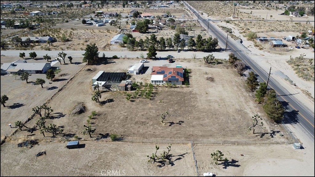 4077 Amador Road Phelan, CA 92371 - Photo 3 of 40 an aerial view of residential houses with outdoor space