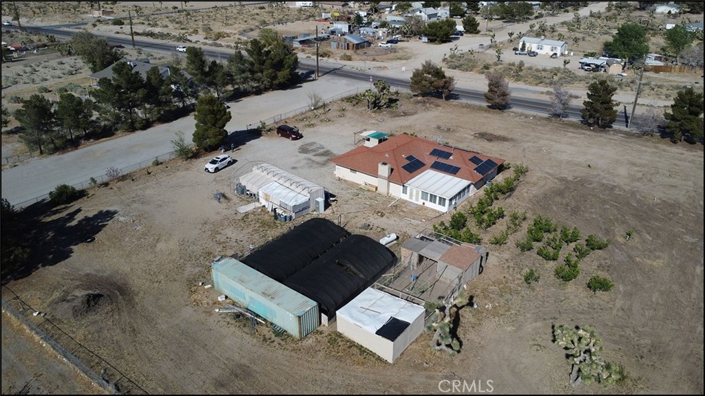4077 Amador Road Phelan, CA 92371 - Photo 4 of 40 an aerial view of a house with a yard