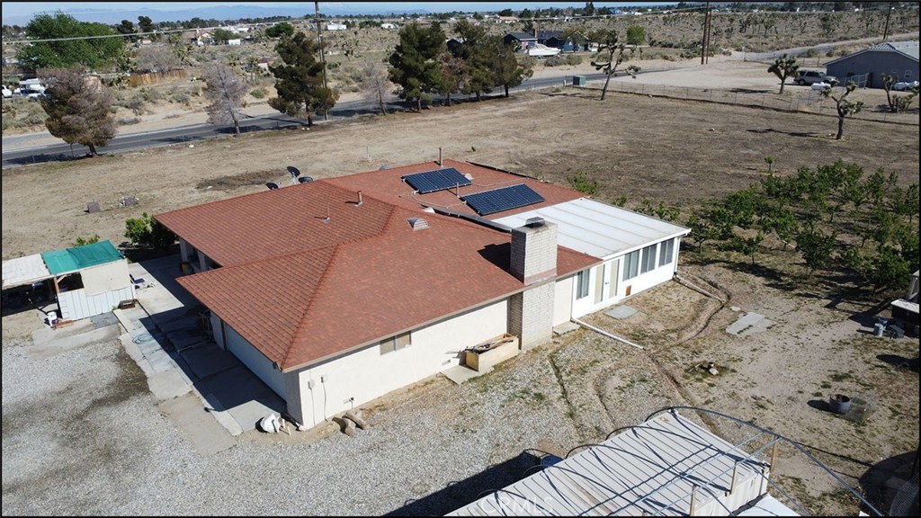 4077 Amador Road Phelan, CA 92371 - Photo 7 of 40 an aerial view of a house with a yard