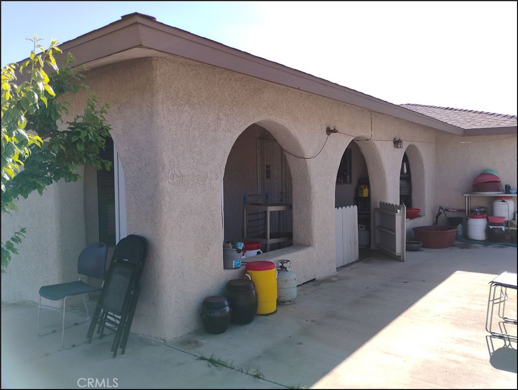 4077 Amador Road Phelan, CA 92371 - Photo 9 of 40 a view of swimming pool with outdoor seating