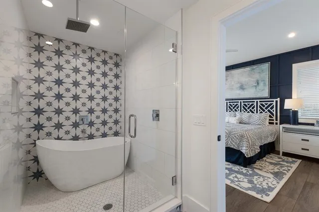 a view of a house with backyard swimming pool and sitting area