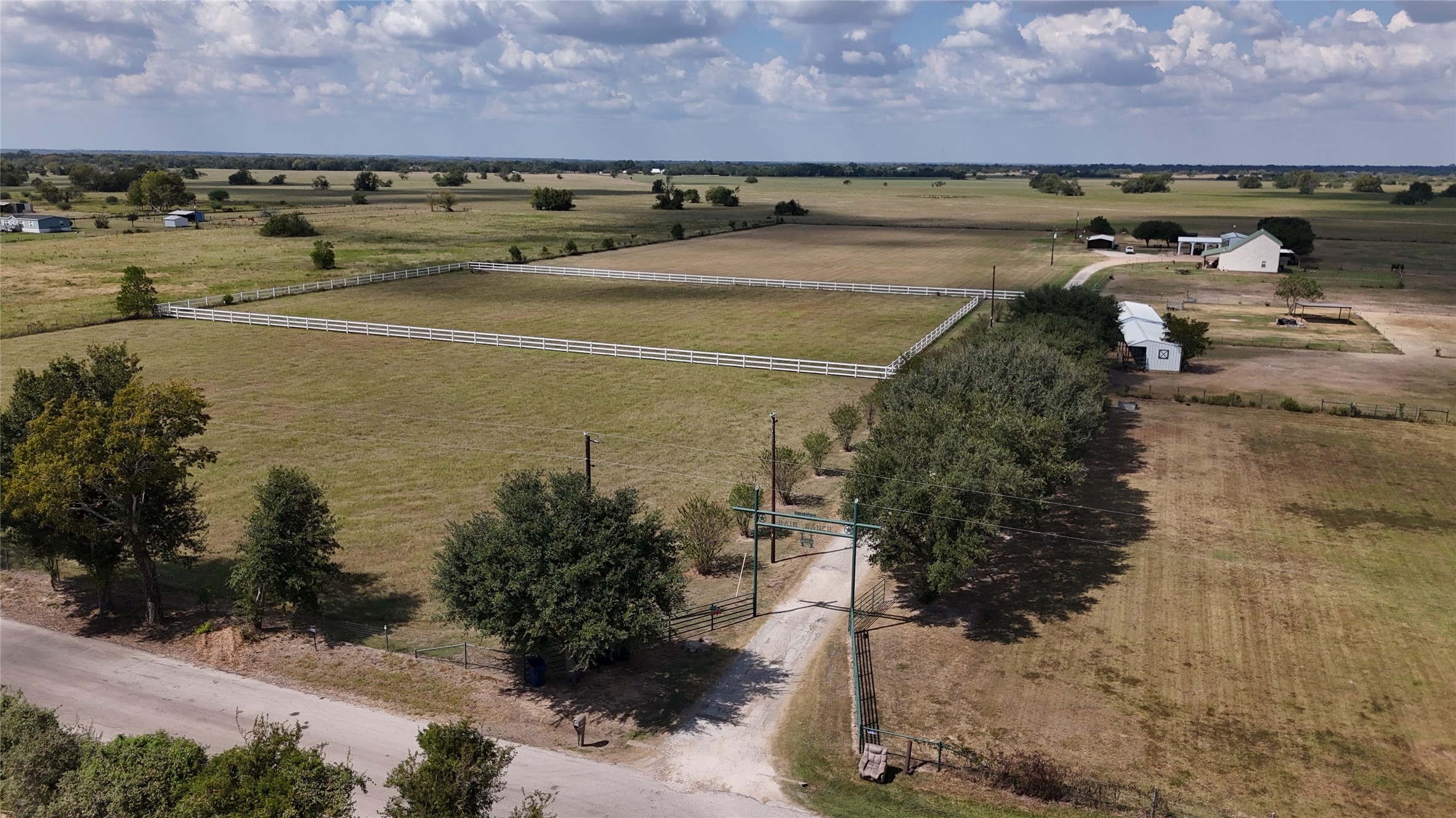 7223 Neiman Road Brookshire, TX 77423 - Photo 17 of 22 a view of a lake with a building in the background
