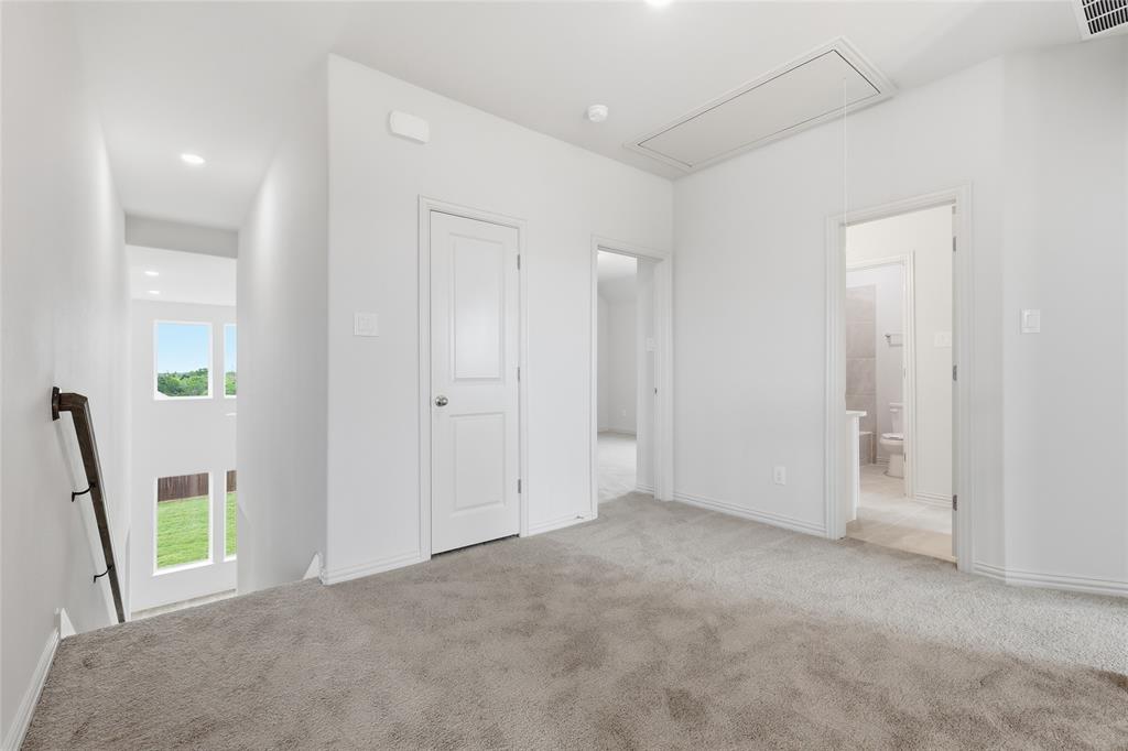 3737 Pitchfork Terrace Anna, TX 75409 - Photo 22 of 33 Open upstairs landing featuring neutral-toned carpeting, white walls, and bright recessed lighting