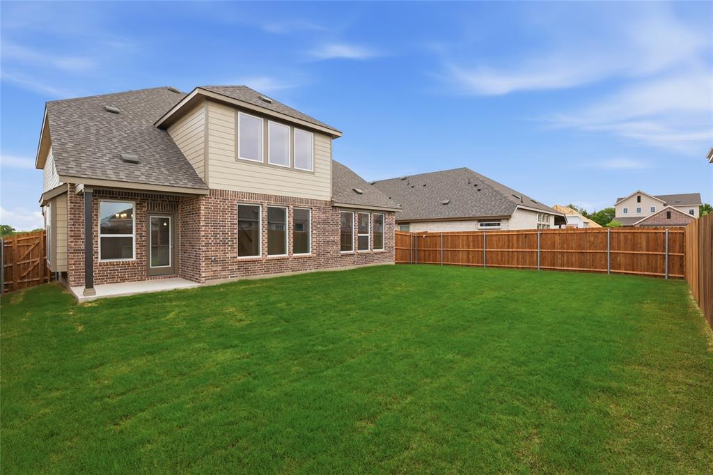 3737 Pitchfork Terrace Anna, TX 75409 - Photo 31 of 33 Expansive green lawn with a privacy fence