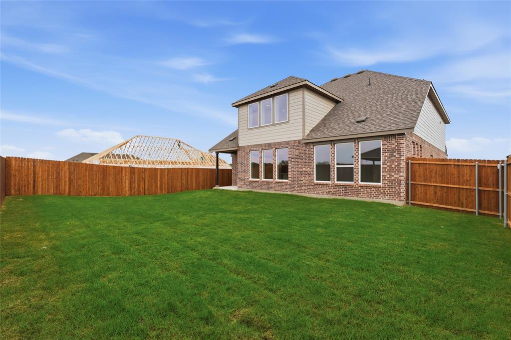 3737 Pitchfork Terrace Anna, TX 75409 - Photo 32 of 33 Expansive grassy backyard featuring a full privacy fence
