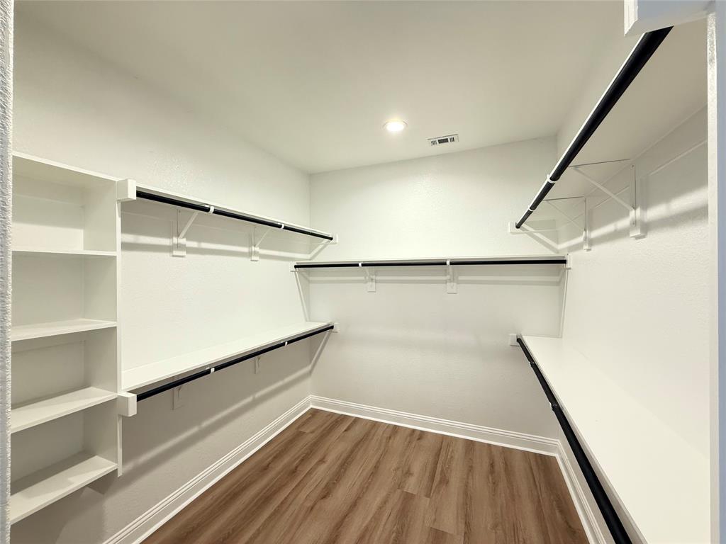 3476 Evergreen Way Midlothian, TX 76065 - Photo 12 of 22 Walk in closet featuring light wood-style flooring