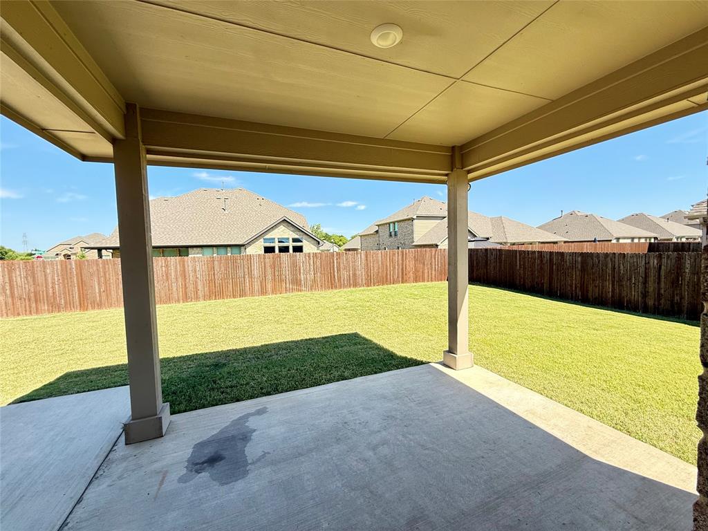 3476 Evergreen Way Midlothian, TX 76065 - Photo 18 of 22 Fenced backyard with a patio and a residential view