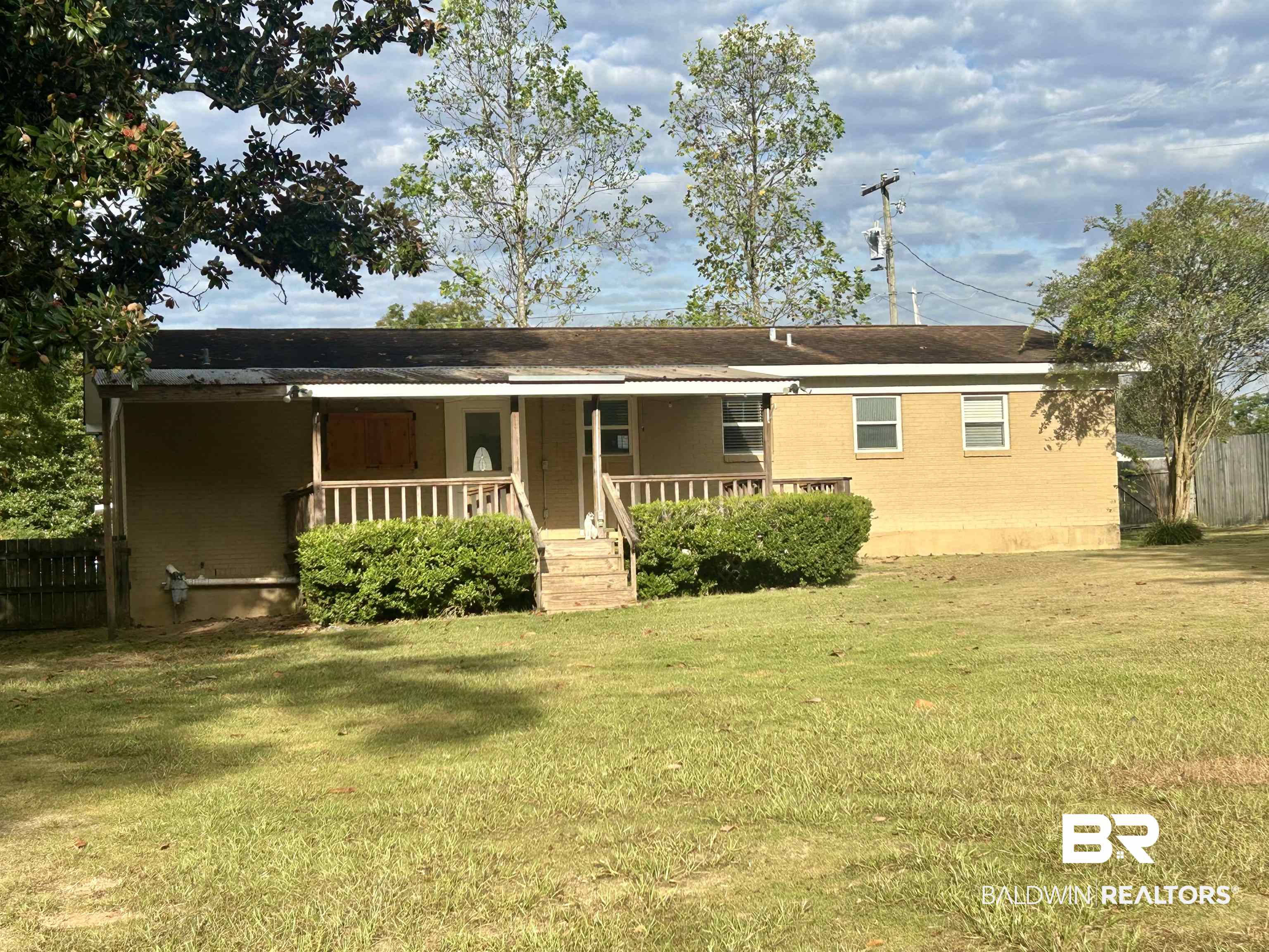 187 Van Hoosen Road Flomaton, AL 36441 - Photo 20 of 29 View of front of home with a porch and brick siding
