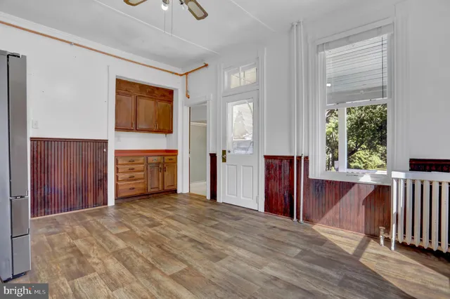 a bathroom with a sink a mirror and vanity