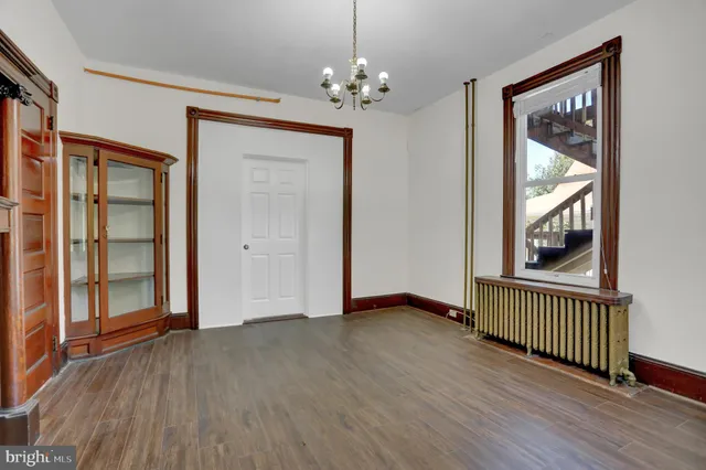 wooden floor & windows in a room