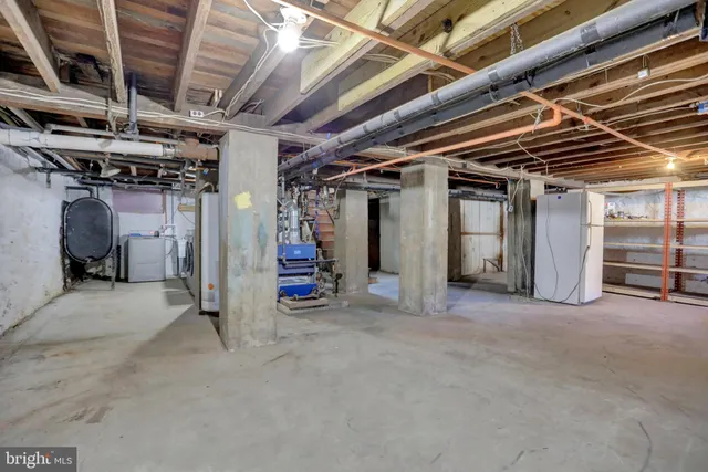 a view of a room with racks on the wall