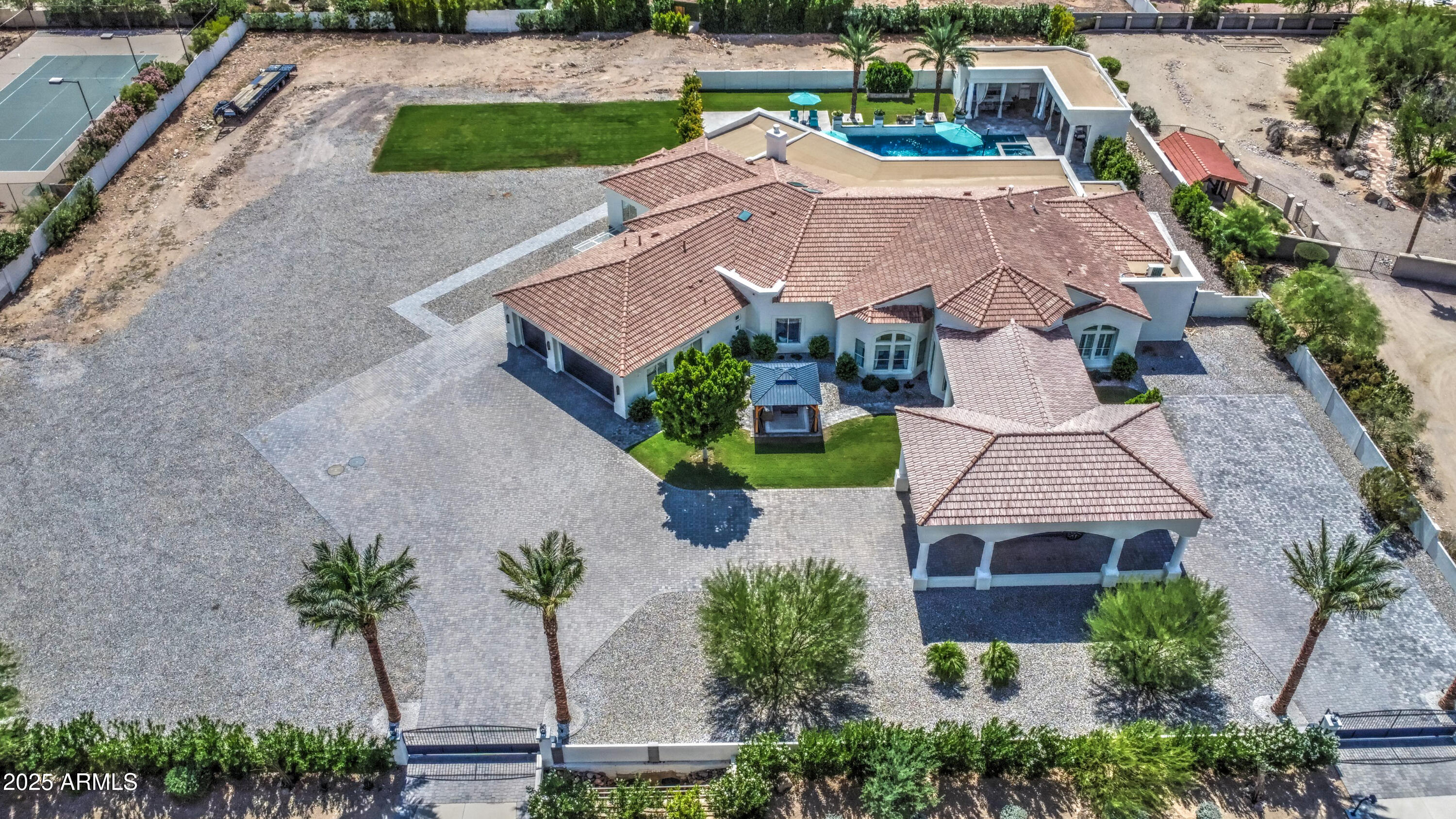 10651 East Cactus Road Scottsdale, AZ 85259 - Photo 120 of 126 an aerial view of a house with garden space and street view