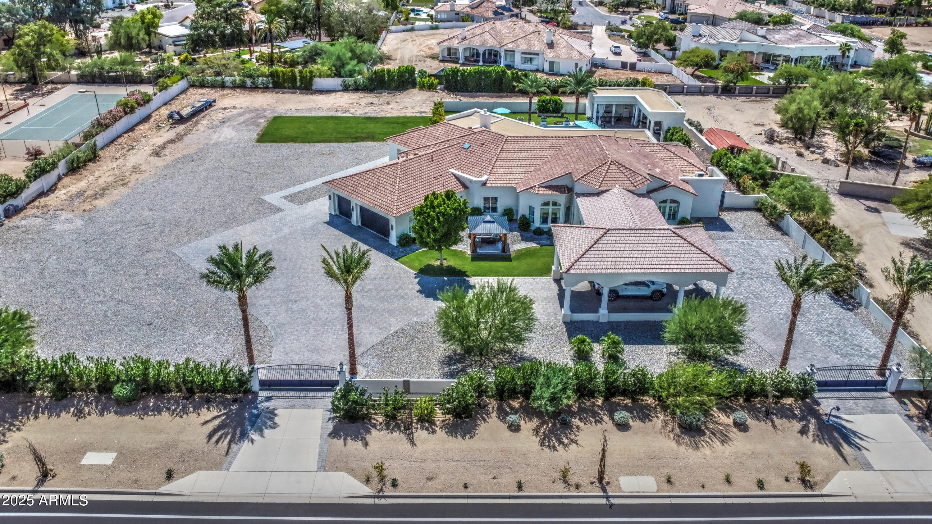 10651 East Cactus Road Scottsdale, AZ 85259 - Photo 123 of 126 an aerial view of a house with a garden and plants