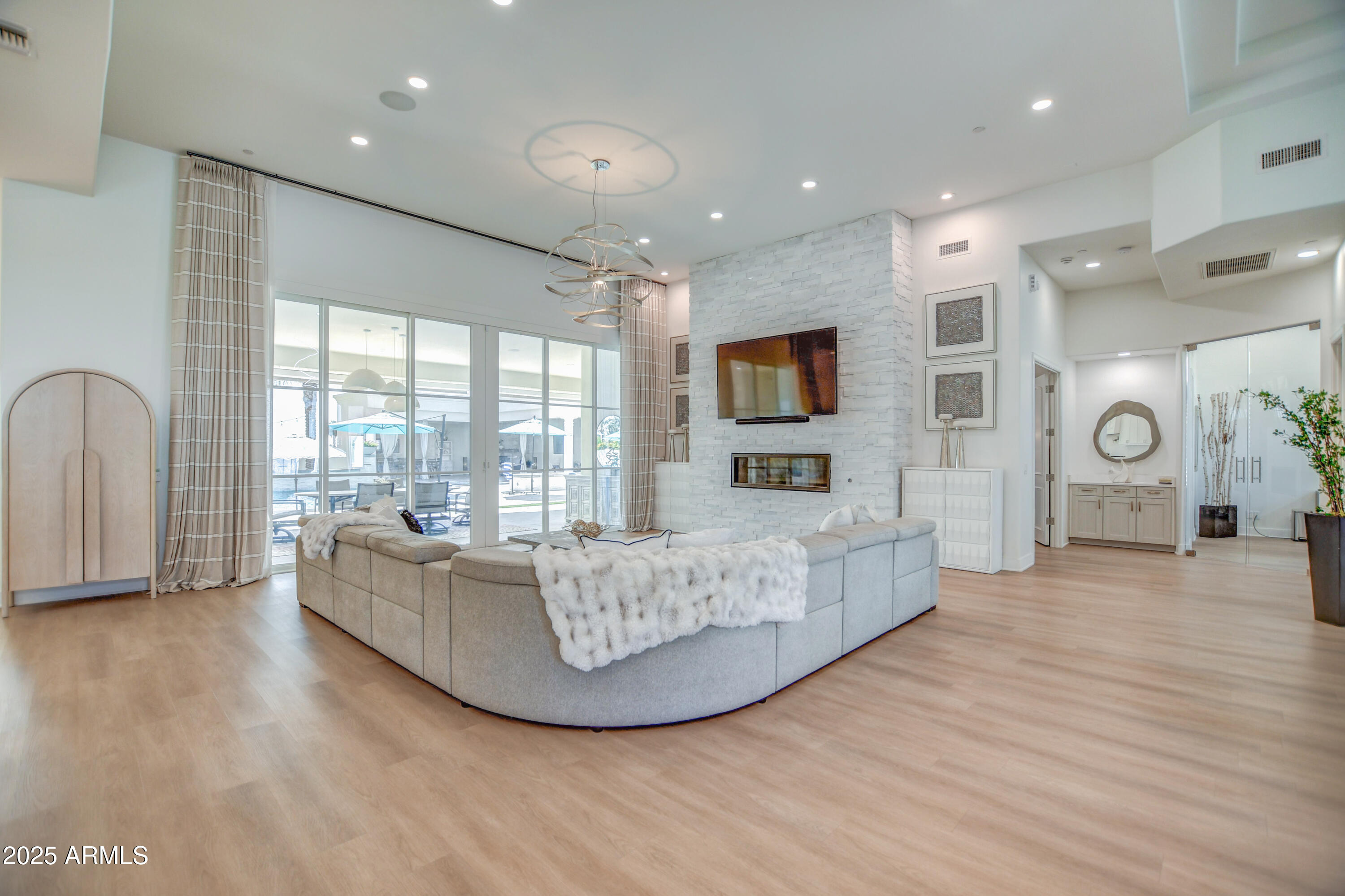 10651 East Cactus Road Scottsdale, AZ 85259 - Photo 38 of 126 a living room with fireplace furniture and a flat screen tv