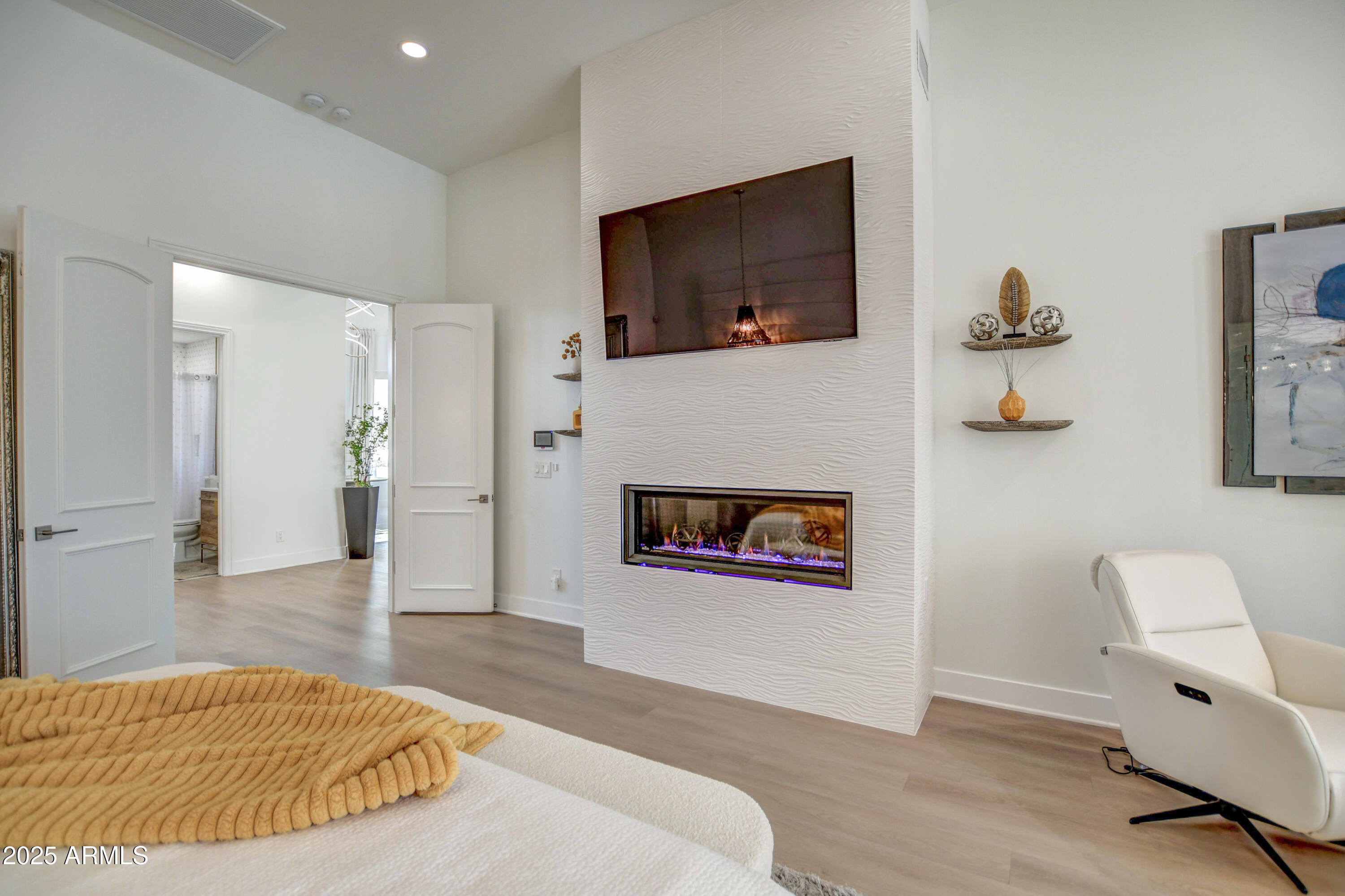10651 East Cactus Road Scottsdale, AZ 85259 - Photo 63 of 126 a living room with furniture and a flat screen tv