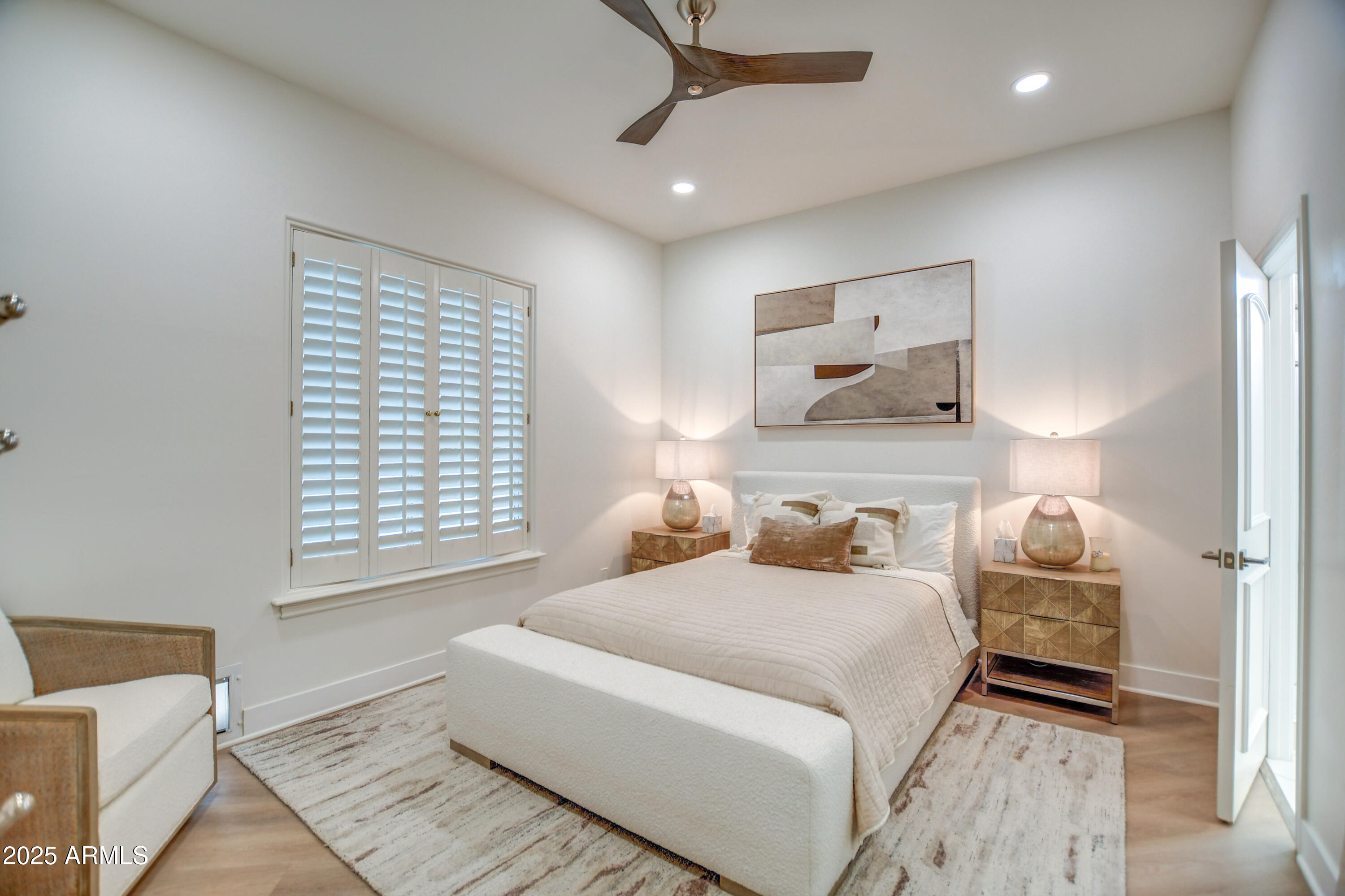10651 East Cactus Road Scottsdale, AZ 85259 - Photo 83 of 126 a bedroom with a bed and a window