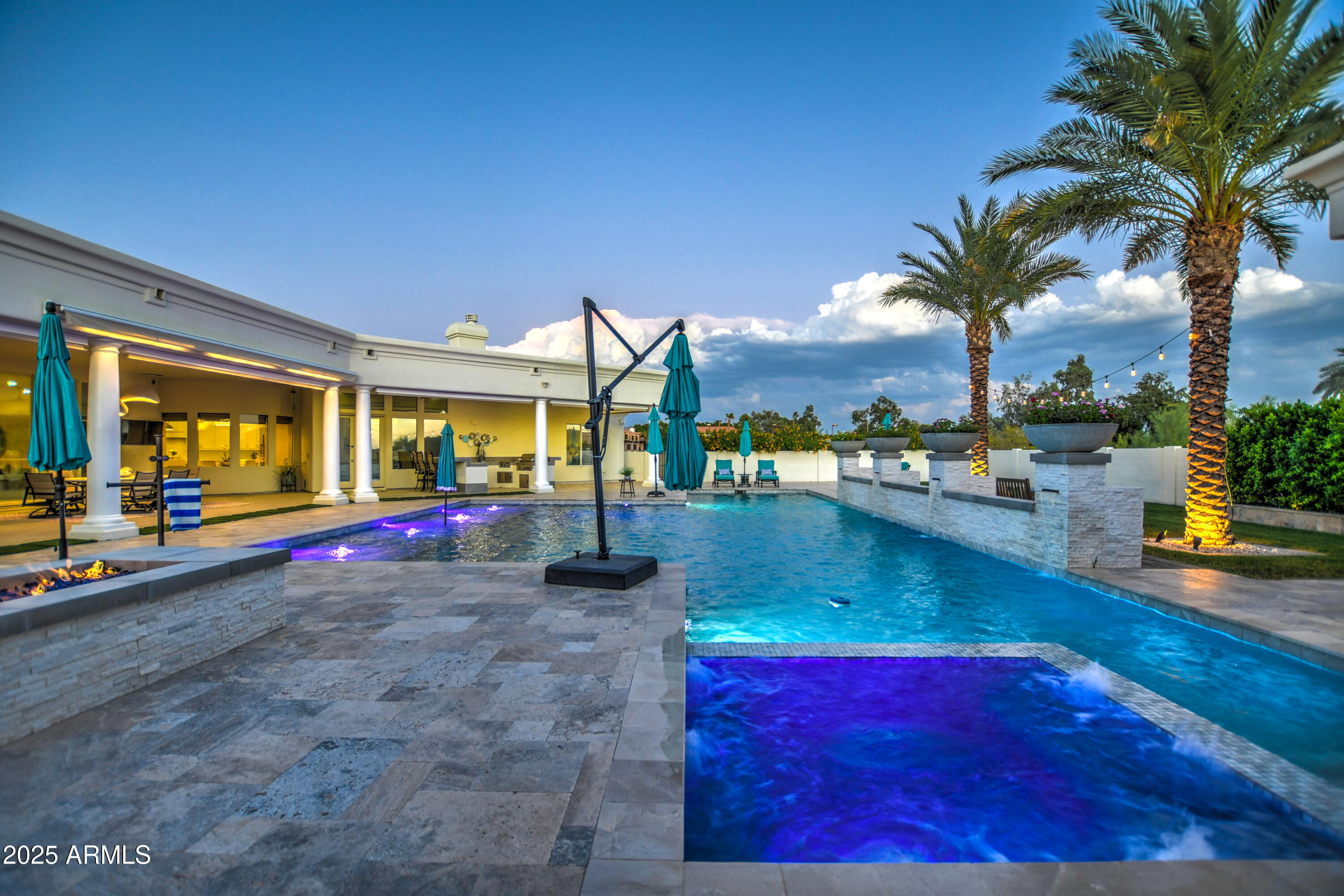 10651 East Cactus Road Scottsdale, AZ 85259 - Photo 91 of 126 a view of swimming pool with outdoor seating