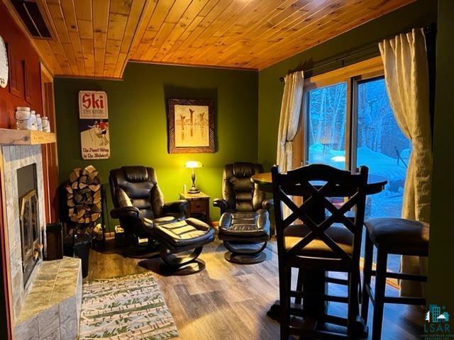 208 Norbakken Road Lutsen, MN 55612 - Photo 39 of 50 This cozy fireplace room leads to the utility/laundry room and outside to the paver patio.