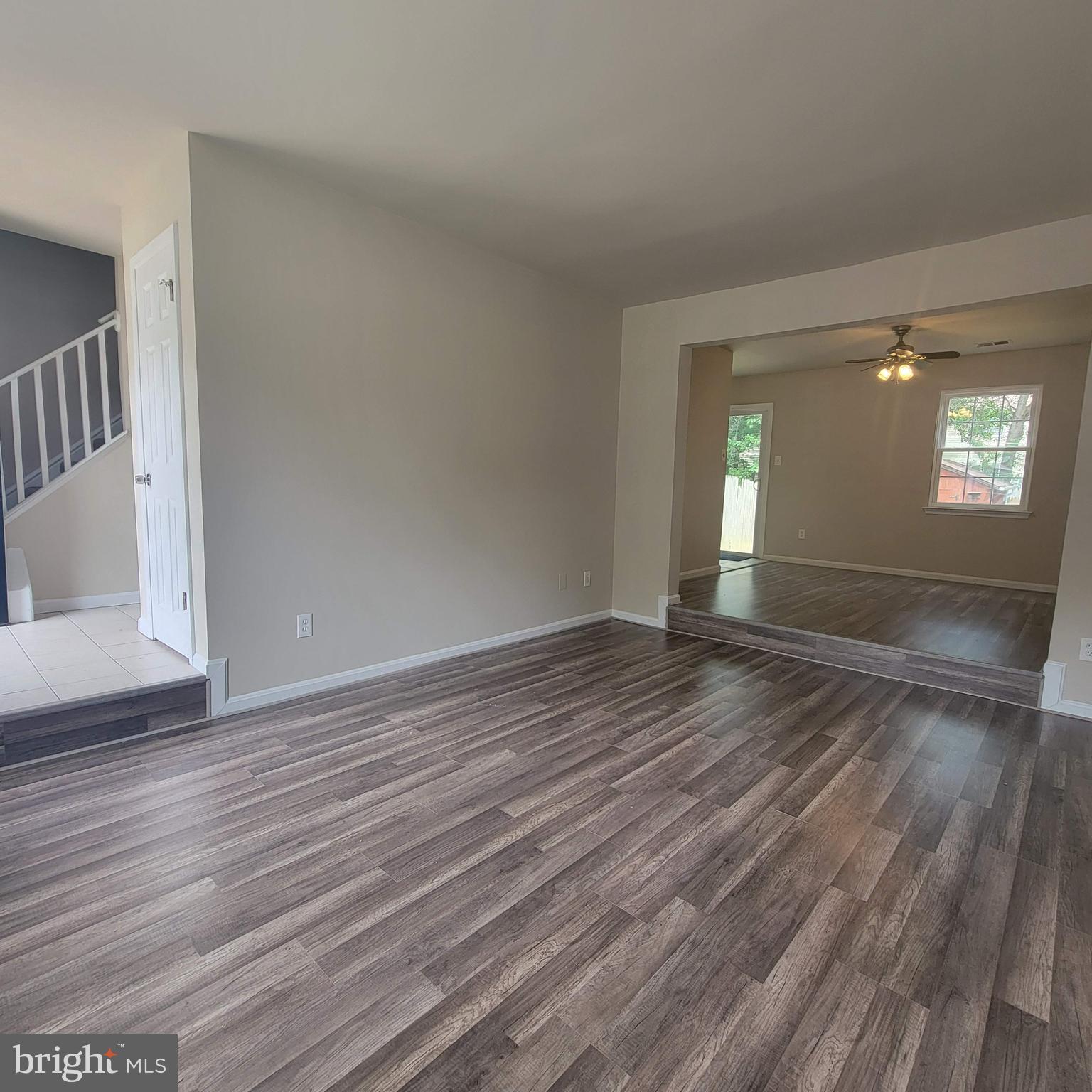 3381 Ryon Court Waldorf, MD 20601 - Photo 5 of 12 a view of empty room with wooden floor and fan