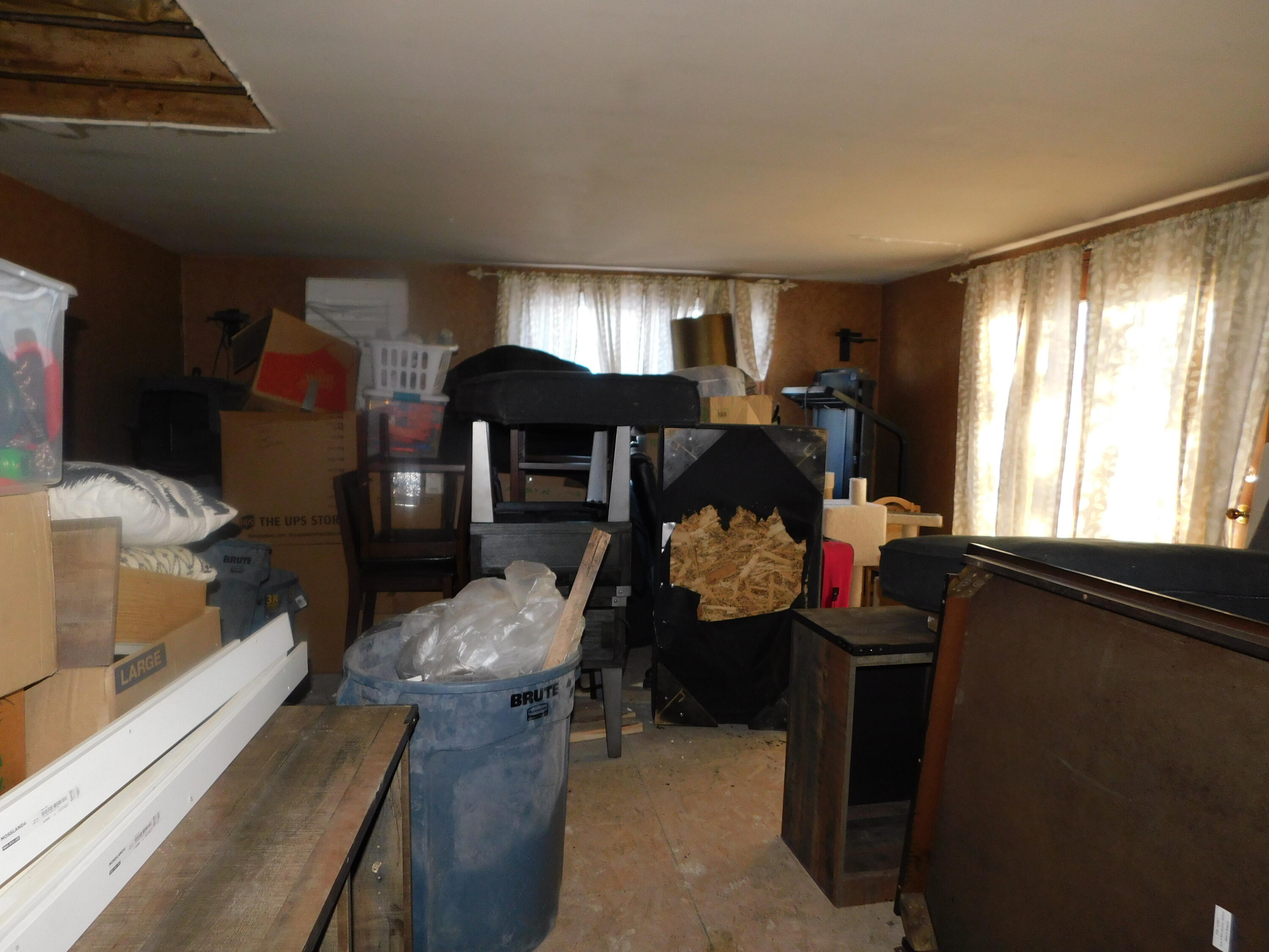 1649 La Porte Avenue Whiting, IN 46394 - Photo 10 of 19 a bedroom with furniture and a window