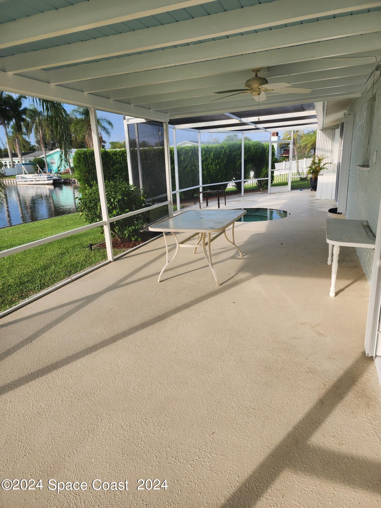 1725 Reef Court Merritt Island, FL 32952 - Photo 20 of 26 a building with a garden space