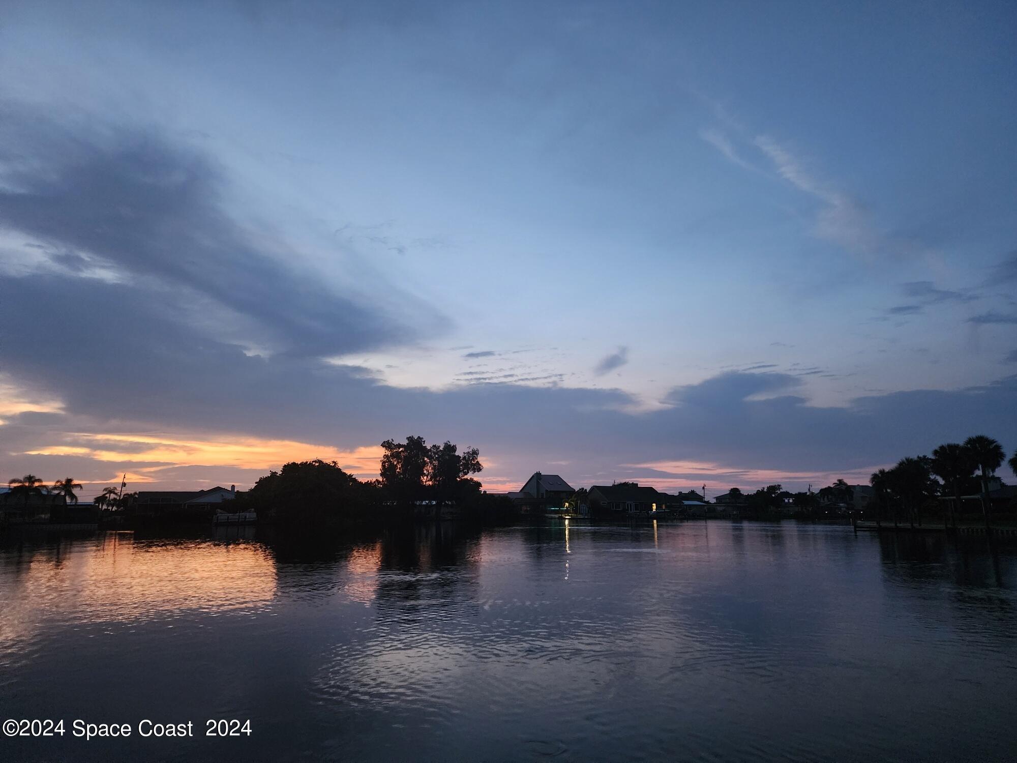 1725 Reef Court Merritt Island, FL 32952 - Photo 2 of 26 a view of lake