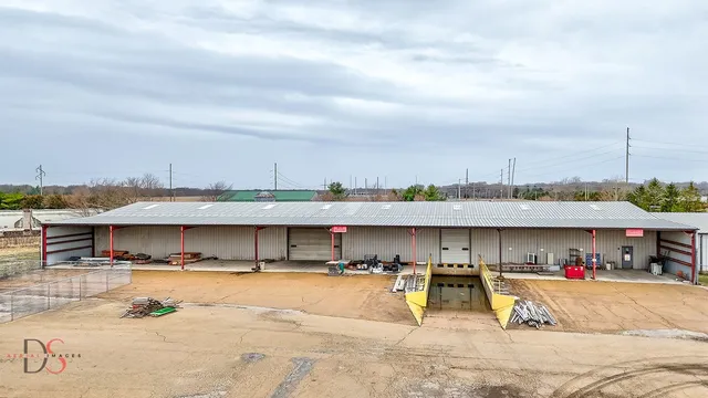 a view of swimming pool with a patio